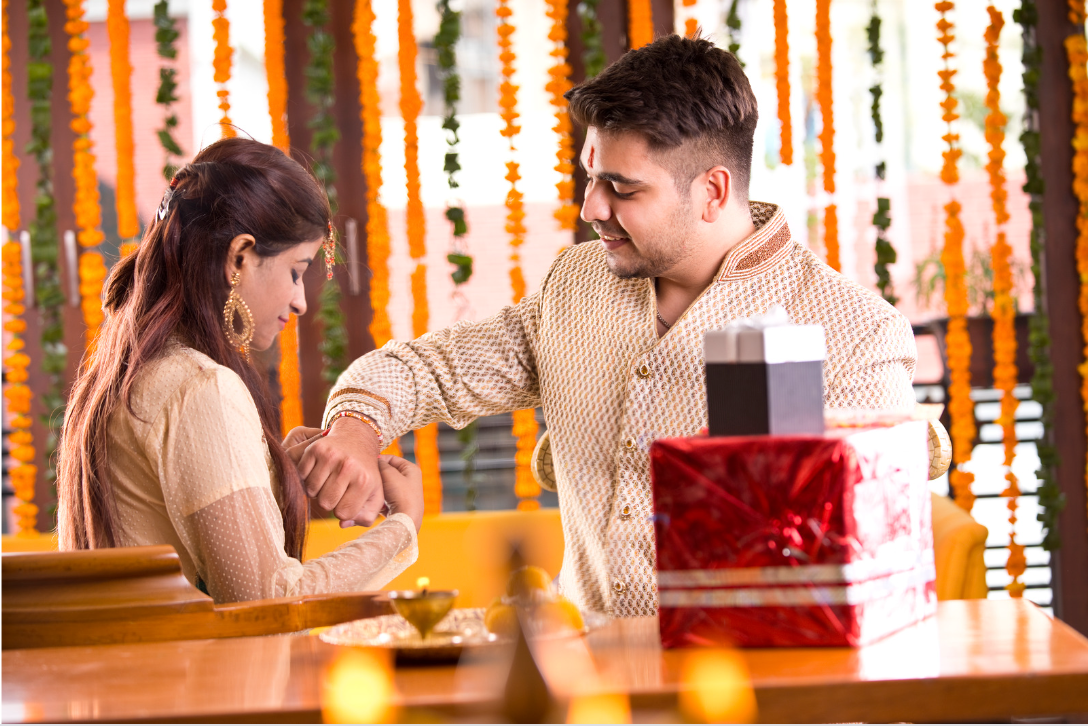 raksha bandhan siblings tie rakhi on wrists