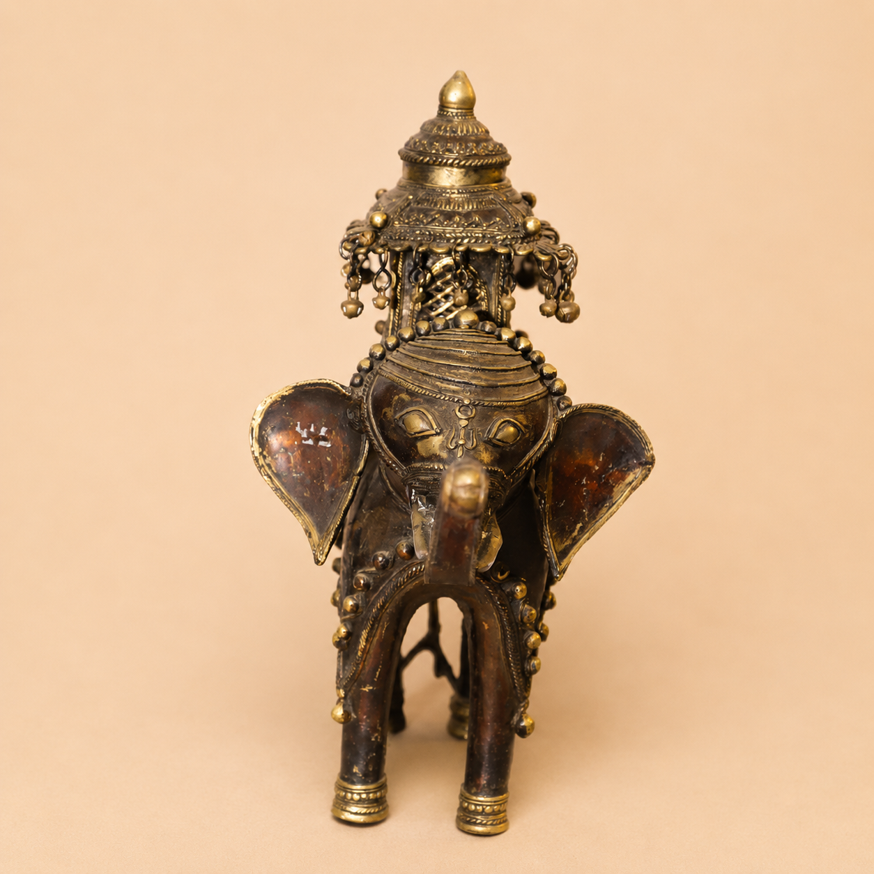 Brass elephant figurine with intricate detailing