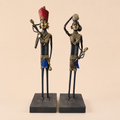 Ornate tribal metal figurines on display