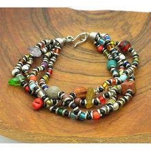 Load image into Gallery viewer, Beaded Multicolored 4 Strand Bracelet Handmade and Fair Trade
